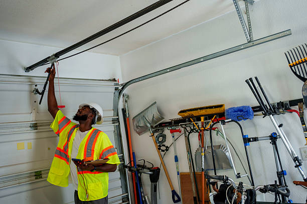 Professional Garage Door Panel Replacement technician working in Mason, MI